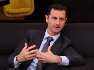 Tổng thống Syria, ông Bashar al-Assad xuất hiện trên truyền hình hồi năm 2012.